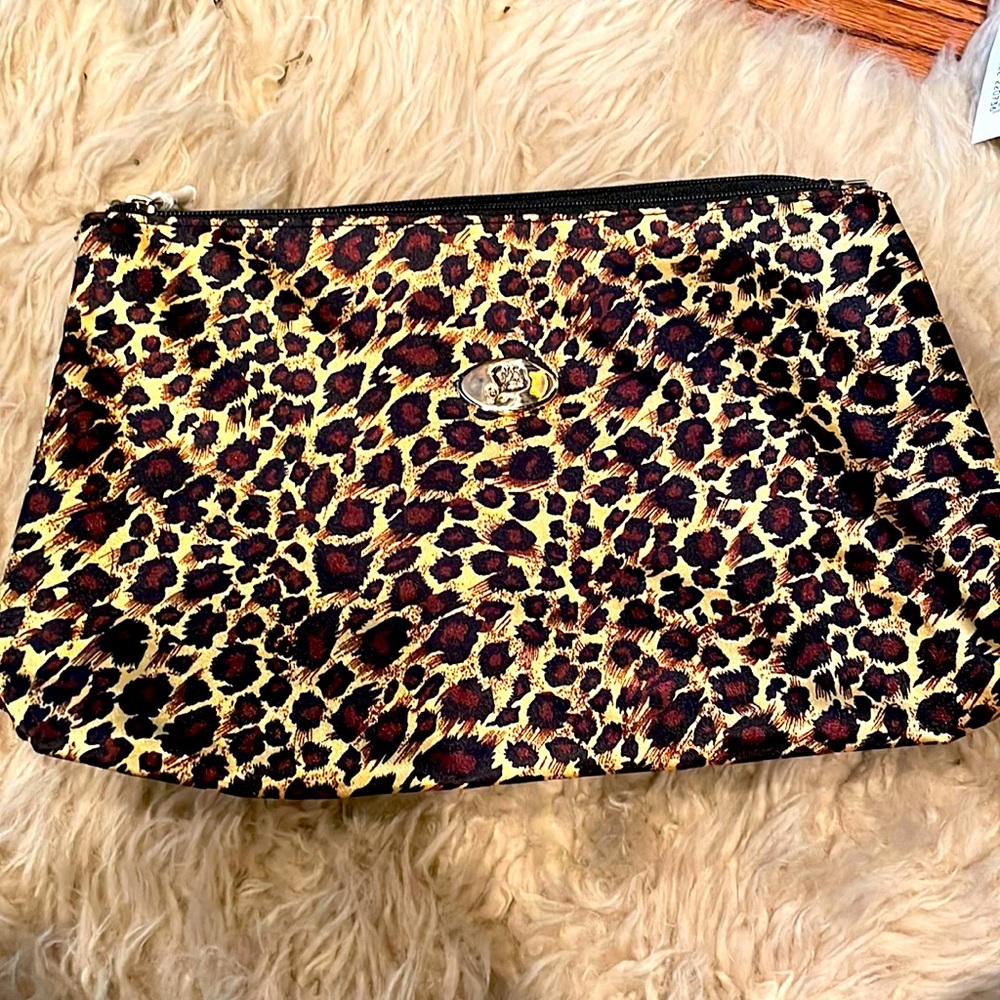 Lancôme Leopard Cosmetic Bag. New! Both sides zip and snap closure.